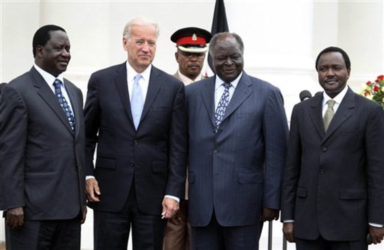 U.S. Vice President Joe Biden, second left, poses for photographs with Kenyan Prime Minister Raila Odinga, left, Kenyan President Mwai Kibaki, third left, and Kenyan Vice President Kalonzo Musyoka, right, at State House Nairobi, Kenya on Tuesday. 
